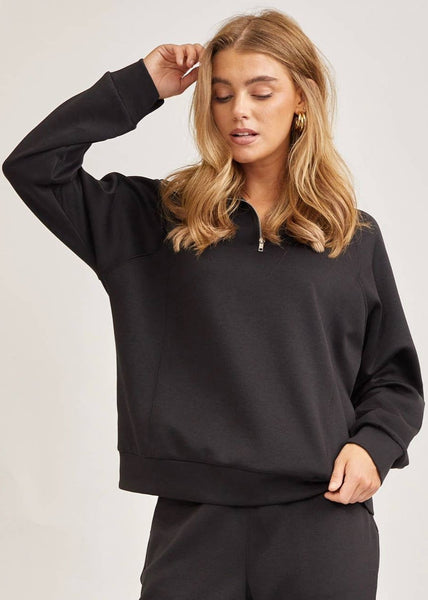 The Travelers Quarter Zip Pullover in Black