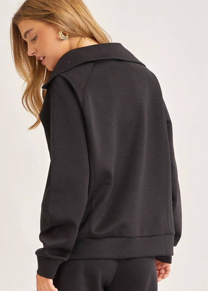 The Travelers Quarter Zip Pullover in Black